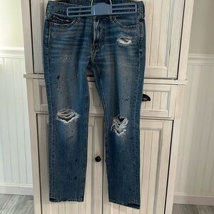 Abercrombie & Fitch Men's Jeans destroyed with paint splatter.